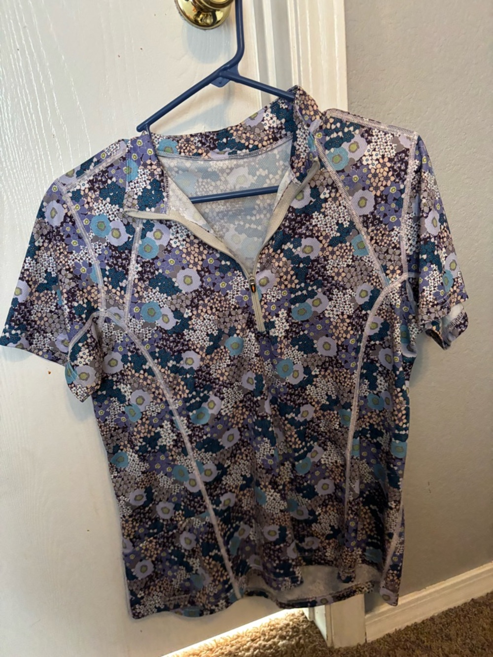 Kerrits Floral Short Sleeve Half-Zip Riding Polo in Blue and Purple